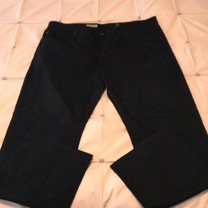 Men’s black jeans.